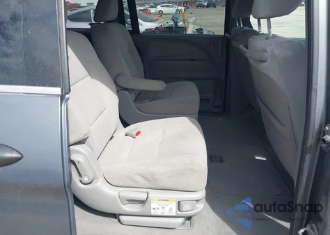 2010 Honda Odyssey Lx z USA, uszkodzony, nr VIN 5FNRL3H28AB099529